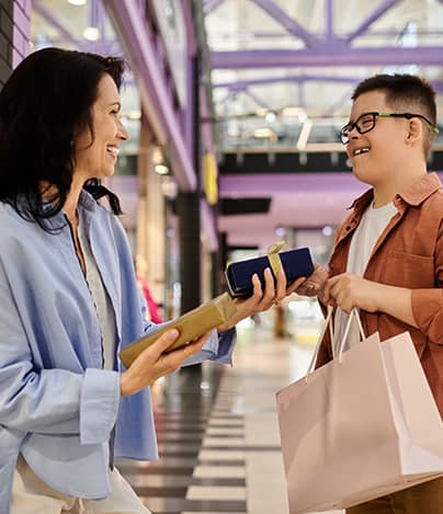 mother-and-son-with-down-syndrome-supporting-care-card